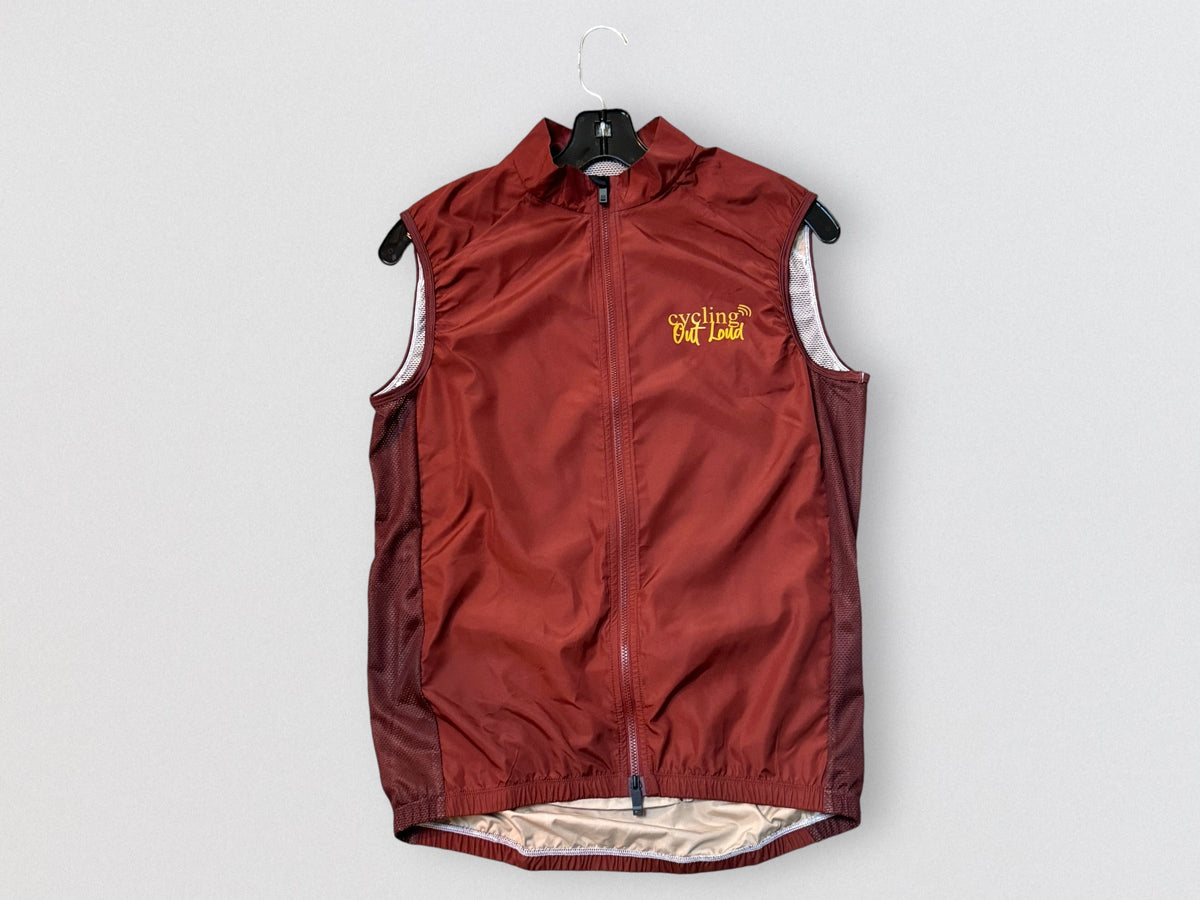 Cycling Out Loud unisex crimson cycling vest/gilet, worn on model, side view, men's fit