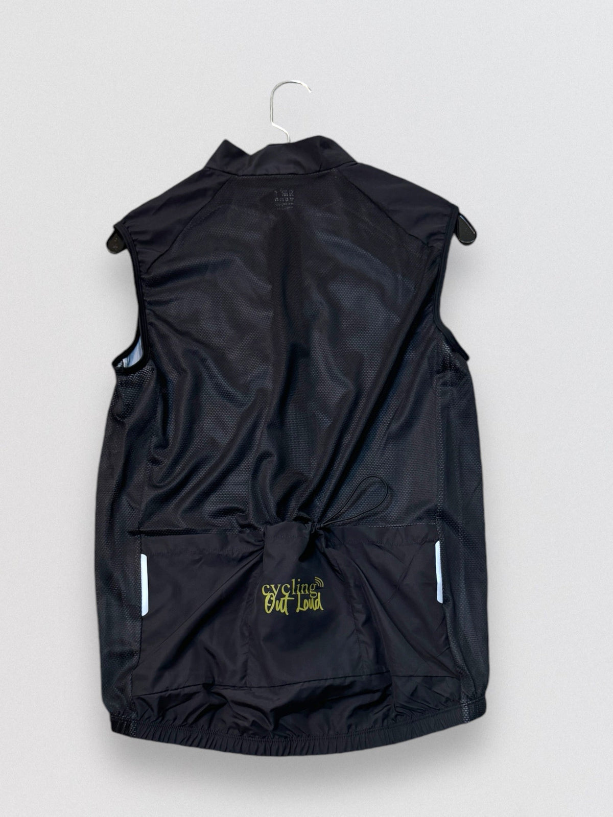 Cycling Out Loud unisex black cycling vest/gilet, worn on model, front angle, women's fit