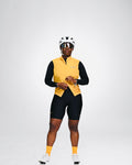 Cycling Out Loud unisex gold cycling vest/gilet, front view, women's fit