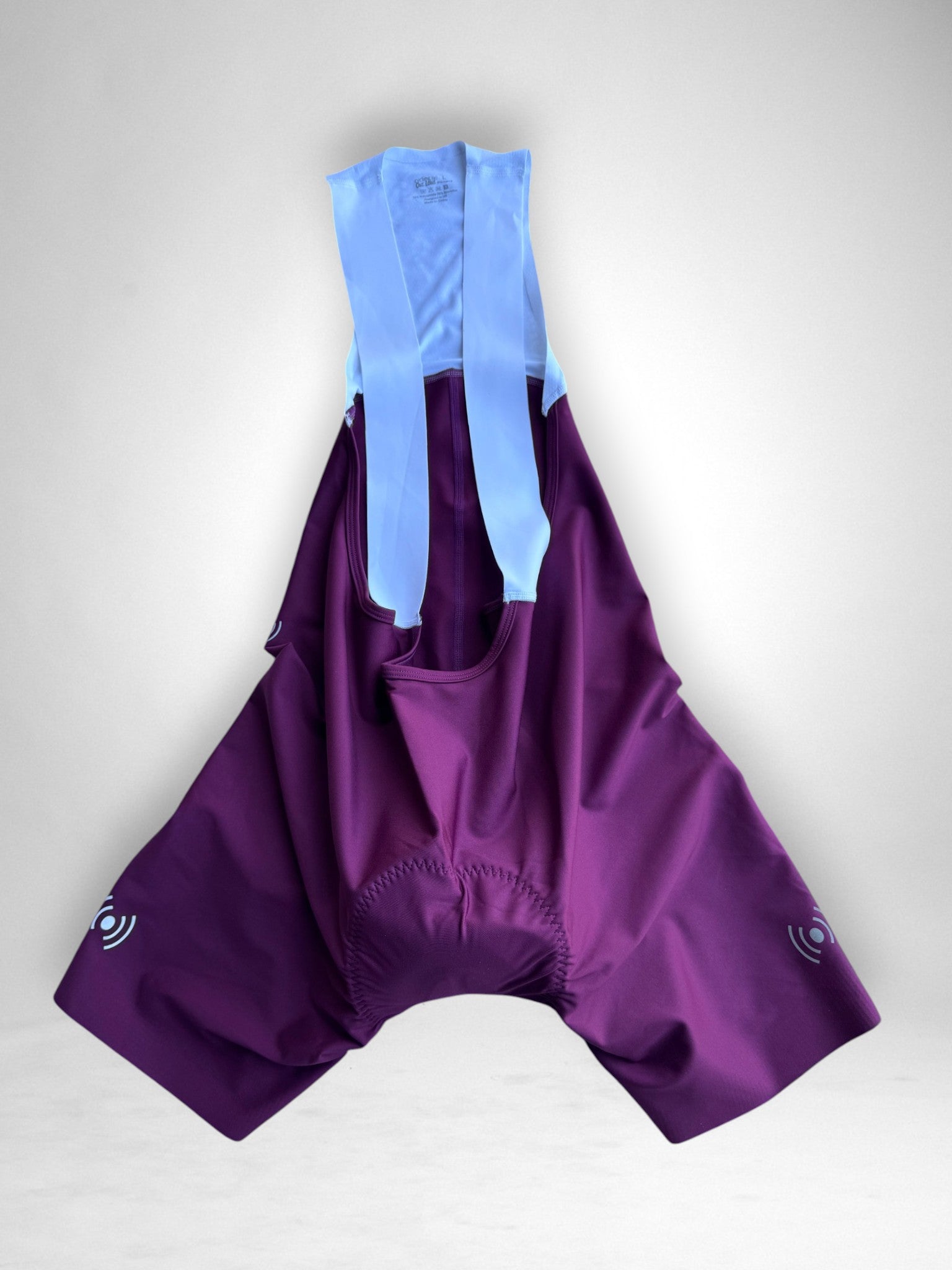Cycling Out Loud Women's Bordeaux bibs worn on model, front angle